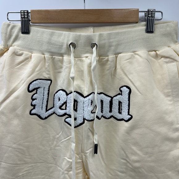 RAW OWN THE NOW MENS SIZE MEDIUM CREAM GRAPHIC PATCH LEGEND 2 POCKET SHORTS - Picture 2 of 9